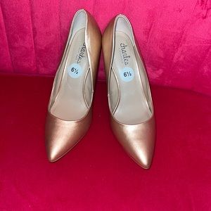 Rose gold pumps